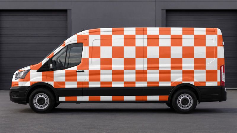 Orange and white checkered pattern showing artwork placement across the van body