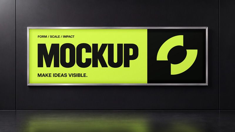 Horizontal lightbox mockup on a black wall with lime green and black MOCKUP artwork in a silver frame