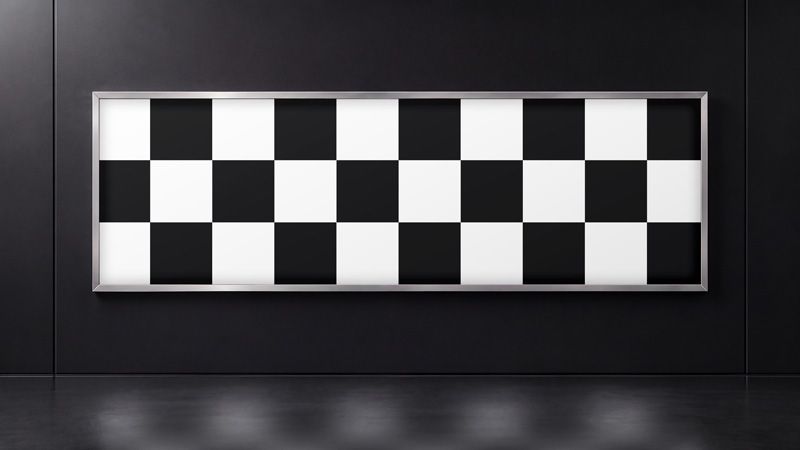 Horizontal lightbox mockup on a black wall with a checkerboard design and a soft floor reflection